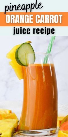 an orange carrot juice recipe with cucumber in the glass and sliced pineapple on the side