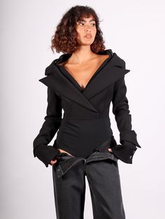 Crafted from luxurious crepe, this bodysuit showcases a sleek, tailored off-the-shoulder neckline, accented with tailored lapels that elegantly highlight the décolletage. Style with jeans for an effortless night out, or with a skirt for a full dress look. Bodysuit snaps in crotch. Style With Jeans, Platform Flats, Black Tank Dress, Black Aviators, Full Dress, Pleats Please Issey Miyake, Mother Denim, Malene Birger, By Malene Birger