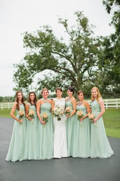 a group of women standing next to each other