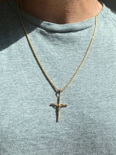 "18kt Gold Filled Crucifix Jesus Necklace - Unisex Chain Length: Options available. Chains can vary by .5\". Model is wearing a 18\" Material: 18 Karat Gold Filled, Hypoallergenic. Tarnish Resistant. Gold-filled does not de-laminate or peel like Gold plated Jewelry nor does it tarnish as readily as silver. Generally speaking, gold filled is better quality and will have a much longer lasting color than plated jewelry. We recommend keeping abrasive chemicals away from the jewelry for the items to Gold Cross Rope Chain Jewelry, Gold Rope Chain Cross Jewelry, Gold Cross Necklace With Rope Chain As A Gift, 14k Gold Spiritual Cross Necklace, Spiritual Yellow Gold Cross Necklace, Spiritual Yellow Gold Jewelry With Rope Chain, Yellow Gold Cross Pendant Jewelry With Rope Chain, Yellow Gold Rope Chain With Cross Pendant Jewelry, Yellow Gold Cross Pendant With Rope Chain