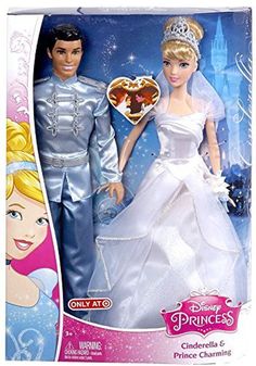 the princess and the frog doll are in their wedding gowns with tiara on