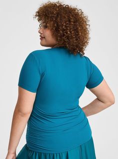 FIT Model is 5'10. 5” wearing size 1. . Measures 28” from shoudler (size 2). MATERIALS + CARE Performance Core Rib knit fabric: All the smoothing lift of our Performance Core fabric, now in a ribbed texture with a flexible feel. Stretch level: Maximum 4-way stretch so you can move without restrictions. Breathable to keep you cool. Maximum coverage and never see-through. Moisture wicking keeps you dry. Smoothing tech delivers light compression. 74% nylon, 26% spandex. Machine wash cold. Tumble dr Versatile Fitted Blue Top, Versatile Blue Crew Neck Top, Fitted Versatile Blue Tops, Blue Fitted Versatile Top, Fitted Seamless Blue Top, Blue Stretch Seamless Tops, Casual Blue Ruched Top, Moisture-wicking Short Sleeve Activewear For Training, Blue Ruched Short Sleeve Top