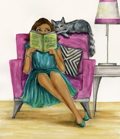 a woman sitting in a chair reading a book with a cat laying on her back