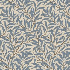 a blue and white wallpaper with leaves on it