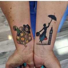 two people with matching tattoos on their arms holding an umbrella and a bag full of gifts