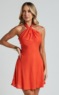 Get ready to turn heads in the Louie Mini Dress - Linen Look Halter Neck Dress In Orange! This vibrant orange dress is perfect for any casual occasion. The A-line silhouette flatters your figure, while the halter neck adds a touch of elegance. Made from soft and breathable viscose fabric, this sleeveless dress will keep you cool and comfortable all day long. Whether you're heading out for brunch or a night on the town, this mini dress is sure to make a statement. Embrace your unique style and fe Summer Orange Dress, Orange Party Dress, Orange Halter Dress, Halter Homecoming Dress, Casual Wedding Guest Dresses, Halter Dress Summer, Basic Black Dress, Spring Maxi Dress, Neon Outfits