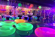 an indoor party with glow in the dark decorations