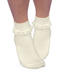 This simplicity lace sock is sure to dress up any outfit and make your little girl feel special. The delicate lace detail on the cuff showcases a beautiful floral pattern that is sure to catch the eye. Look girly and classy with this adorable lace sock. Sock features include smooth toe construction and reciprocated heel and toe for durability.  Perfect for dressing up, everyday, Easter outfits, and much more!Classic floral lace sockCotton rich to keep feet comfortableReciprocated heel and toe with spandex for a perfect fitSmooth toe construction70% Cotton, 27% Nylon, 3% SpandexImported1 Pair 80s Socks, Lacy Socks, Lace Sock, Socks With Lace, Ivory Girls Dress, Frilly Socks, Yellow Socks, Cheap Art, Xmas List