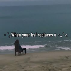 a person sitting in a chair on the beach next to the ocean with an inspirational quote