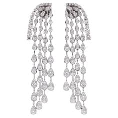 Item Code :- SEE-13132 Gross Wt. :- 15.60 gm 18k White Gold Wt. :- 14.99 gm Natural Diamond Wt. :- 3.05 Ct. ( AVERAGE DIAMOND CLARITY SI1-SI2 & COLOR H-I ) Earrings Size :- 52 mm approx. ✦ Sizing ..................... We can adjust most items to fit your sizing preferences. Most items can be made to any size and length. Please leave a note at checkout or contact us via 1stDibs conversation. Even after purchasing the item, you can still ask us to adjust the size or length. We will try our best to Diamond Chandelier Earrings, Diamond Chandelier, Diamond Clarity, Chandelier Earrings, Colored Diamonds, Or Rose, Natural Diamonds, 18k Gold, Jewelry Earrings