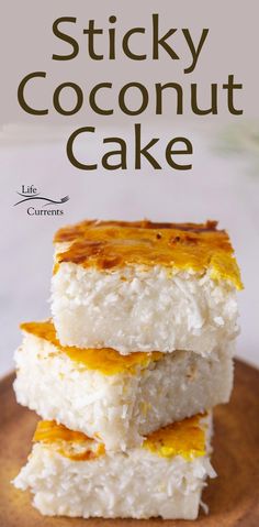 sticky coconut cake is stacked on top of each other with the words, sticky coconut cake