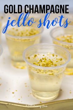 gold champagne jello shots in plastic cups with confetti sprinkles