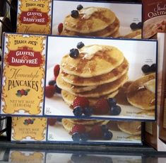 pancakes with blueberries and raspberries are on display