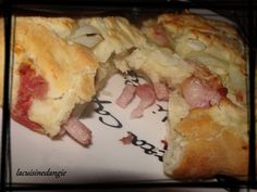 ham and cheese pastry cut in half on a plate