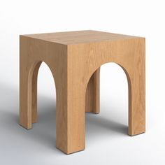 a small wooden stool with an arch design