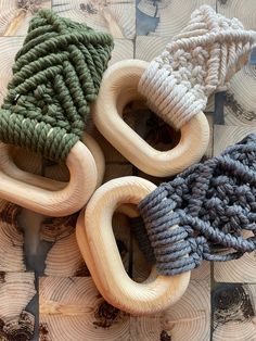 three knitted objects sitting on top of each other