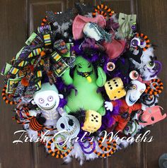 a wreath made up of various halloween items