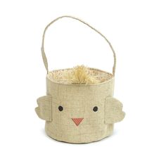 a small basket with a bird face on the front and sides, hanging from a rope