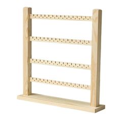 a wooden rack with pegs on it