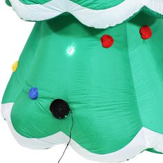 an inflatable christmas tree with lights and decorations