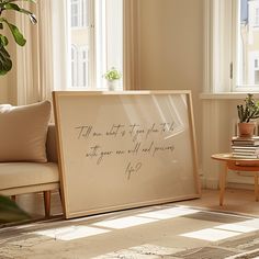 a living room with a couch, coffee table and plant