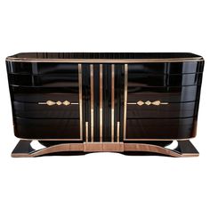 a black and gold dresser with two drawers