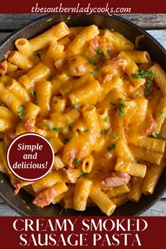 creamy smoked sausage pasta in a skillet with text overlay that reads, simple and delicious