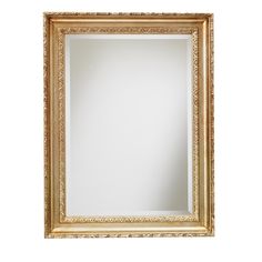 a gold framed mirror on a white wall