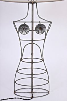 an iron mannequin with two circles on it