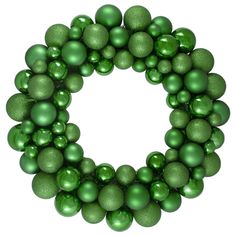 a green christmas ornament wreath on a white background