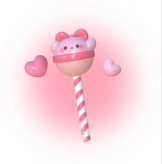 a pink candy lollipop with a bow on it's head and two heart shaped candies