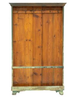 an old wooden cabinet with two doors