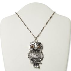 Featuring an owl pendant embellished with light brown glass rhinestone eyes, this attractive necklace design is great for counter sales and gift-giving. Antique Silver Necklace With Metal Antique Finish, Antique Silver Necklace With Metal Finish, Antique Silver Necklace With Antique Finish, Vintage Gunmetal Metal Necklace, Silver Metal Necklaces With Antique Finish, Silver Necklaces With Antique Finish, Rhinestone Eyes, Necklace Antique, Fire Mountain