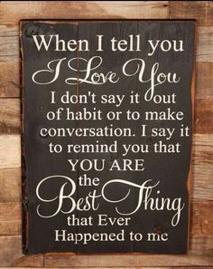 a wooden sign that says, when i tell you love you don't say it out