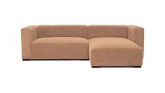 a brown couch sitting on top of a white floor