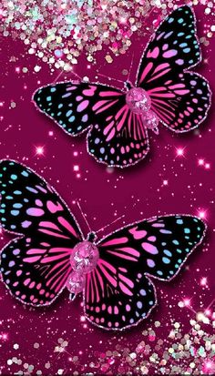 two butterflies flying in the sky with glitters on it's back and purple background