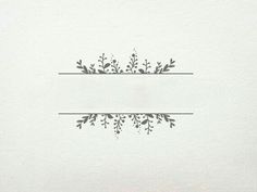 two white cards with floral designs on them