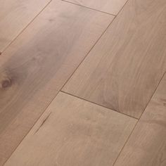 a wooden floor that has been cleaned and is laying on the ground