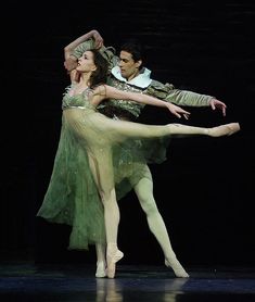 two ballerinas in green tulle and white shirt