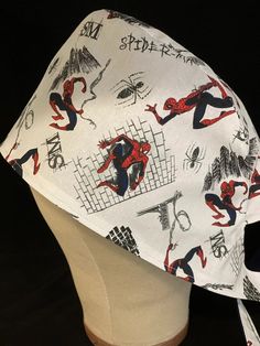 a white hat with spiderman on it