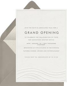 an open lettered card with the words grand opening on it in grey and white