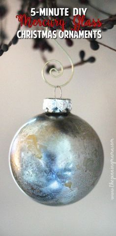 an ornament hanging from a tree with text overlay that reads 5 minute diy merry glass christmas ornaments