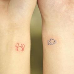 two people with matching tattoos on their arms, one has a crab and the other has a fish