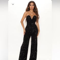 Sequin Jumpsuit Tube V-Wire Neckline Wide Leg Back Zipper Padded Bra Cups Lined Stretch Self: 100% Polyester Lining: 100% Polyester Imported New Years Eve Jumpsuit, Black Sequin Jumpsuit Outfit, Sequin Jumpsuit Outfit, Black Sequin Jumpsuit, Party Jumpsuit, Tube Jumpsuit, Jumpsuit Fitted, Vegas Outfit, Sequin Jumpsuit