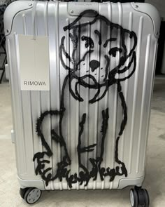 a piece of luggage with a drawing on it