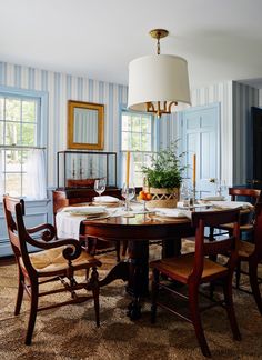 the dining room table is set for four