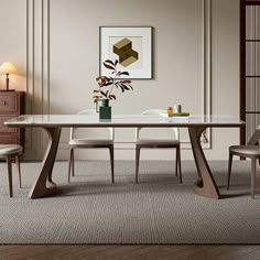 a dining room table with chairs around it