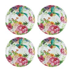 four plates with flowers and butterflies on them