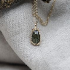 A beautiful mossy green tourmaline set in a woodland inspired pendant, adorned with little lichen detail. ~ 9ct Yellow Gold ~ 10 x 7mm Green Tourmaline ~16 x 9mm pendant ~ 20in 9ct gold chain ~ hallmarked in London Only one available & ready to ship. Mossy Green, Tourmaline Pendant, Tourmaline Necklace, Green Tourmaline, Last Minute Gifts, Gold Chain, Gold Chains, Tourmaline, Jewelry Necklace Pendant