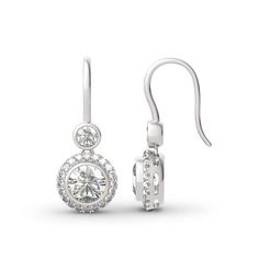 This beautiful style is a perfect gift for any lady or the perfect reason to spoil yourself! Designed in sterling silver, each earring features a sparkling round cut stone wrapped in a glistening halo as the drop. All stones glisten with every beat of her heart and every turn of her head. Celebrate your sweetheart with these sweet drop earrings.Carat Weight: 5 ctStone Size: 7 mmStone Type: Jeulia® StoneNumber of Stones: 2 Carat Weight: 1.29 ctStone Size: 1.3,4 mmStone Type: Jeulia® StoneNumber o Dazzling Sterling Silver Cluster Earrings With Halo Design, Anniversary Halo Cluster Earrings In Sterling Silver, Anniversary Halo Sterling Silver Cluster Earrings, Dazzling Round Sterling Silver Cluster Earrings, Sterling Silver Halo Hoop Earrings For Formal Events, Formal Sterling Silver Hoop Earrings With Halo, Sterling Silver Halo Hoop Earrings For Formal Occasions, Anniversary Sterling Silver Halo Cluster Earrings, Formal Round Jewelry With Ear Wire